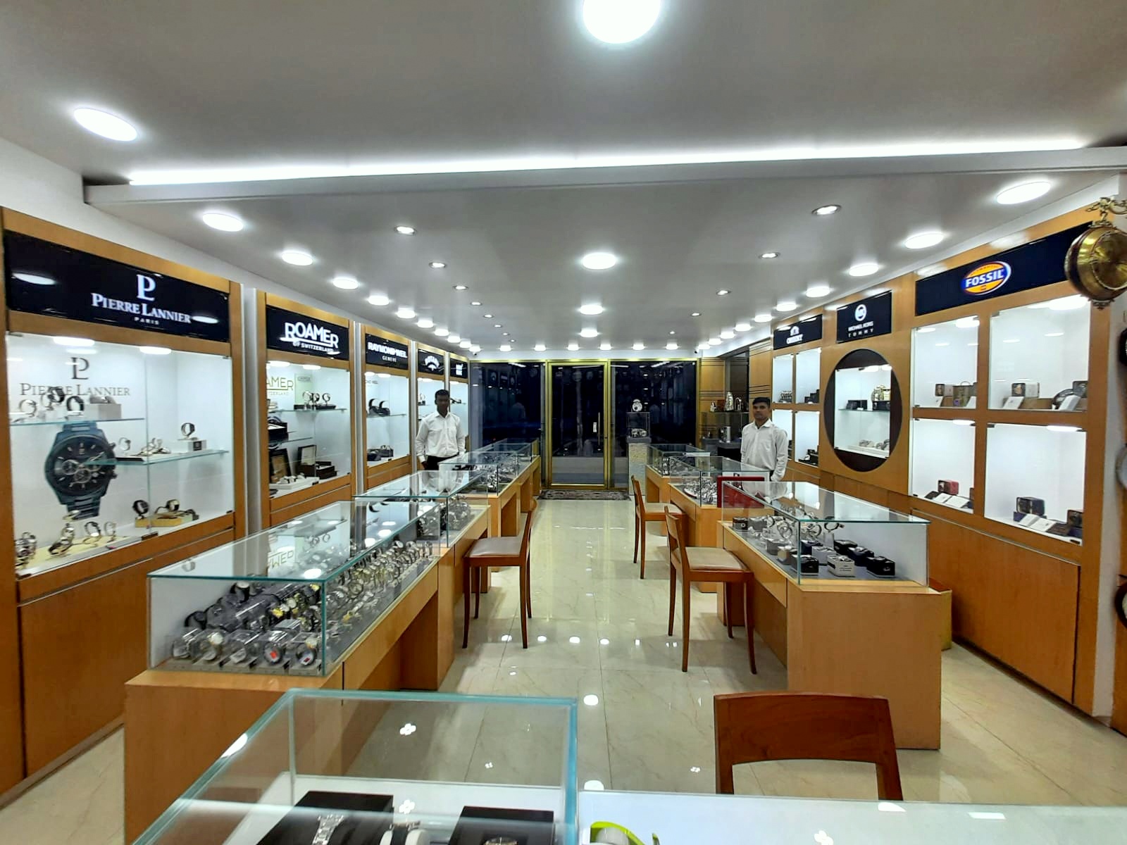 A watch movement being assembled by a watchmaker.